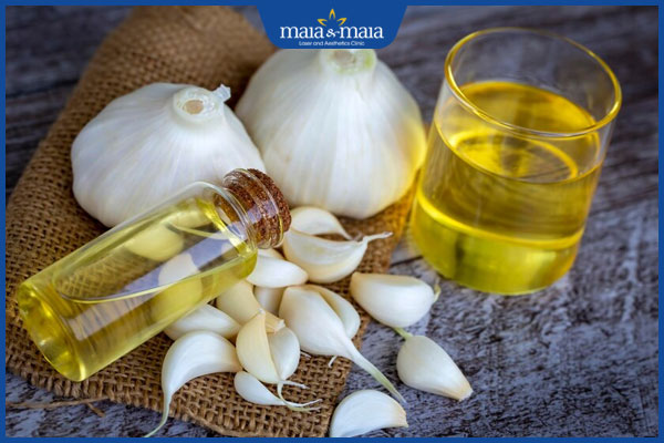 dùng dầu tỏi chữa sẹo lồi